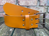 Plain leather 50mm wide belt with 2 prong dark brass look steel roller buckle. Choice of 13 colours