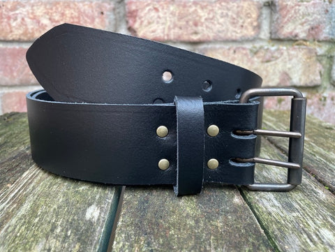 Plain leather 50mm wide belt with 2 prong dark brass look steel roller buckle. Choice of 13 colours