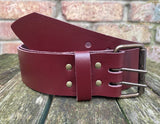 Plain leather 50mm wide belt with 2 prong dark brass look steel roller buckle. Choice of 13 colours