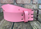 Plain leather 50mm wide belt with 2 prong dark brass look steel roller buckle. Choice of 13 colours