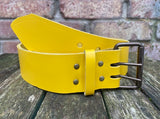 Plain leather 50mm wide belt with 2 prong dark brass look steel roller buckle. Choice of 13 colours