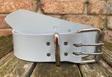 Plain leather 2" (50mm) wide belt with 2 prong nickel plated steel roller buckle. Choice of colour.