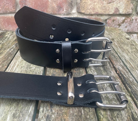 Plain leather 2" (50mm) wide belt with 2 prong nickel plated steel roller buckle. Choice of colour.