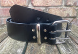 Plain leather 2" (50mm) wide belt with 2 prong nickel plated steel roller buckle. Choice of colour.