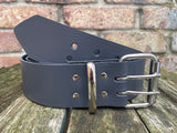 Plain leather 50mm wide belt with 2 prong nickel plated steel roller buckle. Choice of 13 colours
