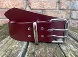 Plain leather 50mm wide belt with 2 prong nickel plated steel roller buckle. Choice of 13 colours