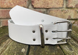 Plain leather 2" (50mm) wide belt with 2 prong nickel plated steel roller buckle. Choice of colour.