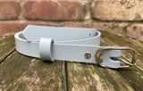 Plain leather 19mm wide belt with nickle plated steel buckle. Choice of 13 colours 692