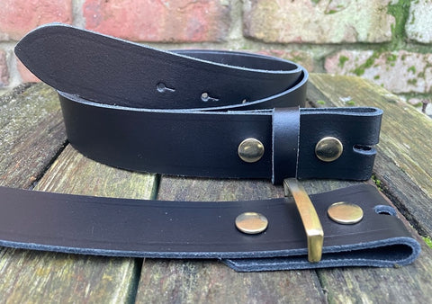 Plain leather 19mm-50mm wide press stud/snap belt with brass plated steel studs. Choice of 13 colours.