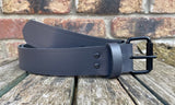 Plain leather 19mm-50mm wide belt with black single roller buckle. Choice of 13 colours