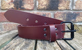 Plain leather 19mm-50mm wide belt with black single roller buckle. Choice of 13 colours