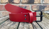 Plain leather 19mm-50mm wide belt with black single roller buckle. Choice of 13 colours
