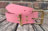 Plain leather 19mm-50mm wide belt with solid brass single roller buckle. Choice of 13 colours