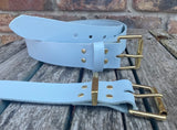 Plain leather 19mm-50mm wide belt with solid brass single roller buckle. Choice of 13 colours