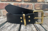 Plain leather 19mm-50mm wide belt with solid brass single roller buckle. Choice of 13 colours