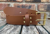 Plain leather 19mm-50mm wide belt with solid brass single roller buckle. Choice of 13 colours