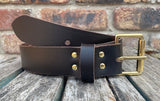 Plain leather 19mm-50mm wide belt with solid brass single roller buckle. Choice of 13 colours