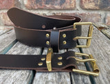 Plain leather 19mm-50mm wide belt with solid brass single roller buckle. Choice of 13 colours
