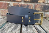 Plain leather 19mm-50mm wide belt with solid brass single roller buckle. Choice of 13 colours