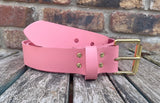 Plain leather 19mm-50mm wide belt with solid brass single roller buckle. Choice of 13 colours