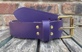Plain leather 19mm-50mm wide belt with solid brass single roller buckle. Choice of 13 colours
