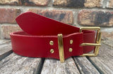 Plain leather 19mm-50mm wide belt with solid brass single roller buckle. Choice of 13 colours