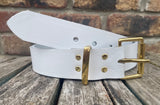 Plain leather 19mm-50mm wide belt with solid brass single roller buckle. Choice of 13 colours