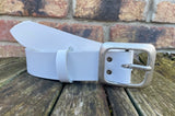 Plain leather 38mm wide belt with pewter rectangle buckle. Choice of 13 colours