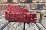 Crocodile skin look buffalo leather 19mm-50mm wide belt with antique brass look steel roller buckle. Choice of 5 colours