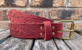 Red crocodile skin look buffalo leather belt & solid brass roller buckle. Choice of width
