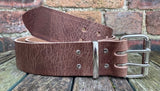 Buffalo leather 50mm wide belt with 2 prong nickel plated steel roller buckle. Choice of 9 colours