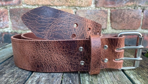 Buffalo leather 50mm wide belt with 2 prong nickel plated steel roller buckle. Choice of 9 colours