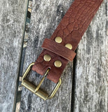 Crocodile skin look buffalo leather belt & antique brass look steel roller buckle. Choice of width & colour.