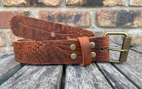 Crocodile skin look buffalo leather belt & antique brass look steel roller buckle. Choice of width & colour.