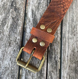 Crocodile skin look buffalo leather belt & antique brass look steel roller buckle. Choice of width & colour.