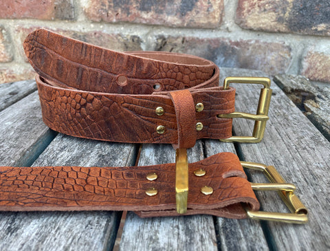 Cognac crocodile skin look buffalo leather belt & solid brass roller buckle. Choice of width