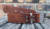 Crocodile skin look buffalo leather 19mm-50mm wide belt with with nickel plated steel light roller buckle. Choice of 5 colours