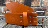 Buffalo leather 50mm wide belt with 2 prong nickel plated steel roller buckle. Choice of 9 colours