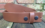 Plain leather 19mm-50mm wide press stud/snap belt with black steel studs. Choice of 13 colours.