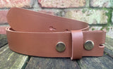 Plain leather 19mm-50mm wide press stud/snap belt with brass plated steel studs. Choice of 13 colours.