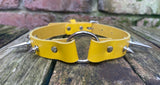 Spiked o-ring leather choker approx 19mm wide. Choice of 13 colours and spike size.