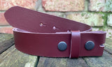 Plain leather 19mm-50mm wide press stud/snap belt with black steel studs. Choice of 13 colours.
