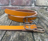 Plain leather 19mm wide belt with nickel plated or gold plated buckle. Choice of 13 colours.
