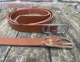 Plain leather 19mm wide belt with nickel plated or gold plated buckle. Choice of 13 colours.