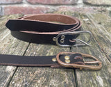 Plain leather 19mm wide belt with nickel plated or gold plated buckle. Choice of 13 colours.