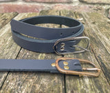 Plain leather 19mm wide belt with nickel plated or gold plated buckle. Choice of 13 colours.