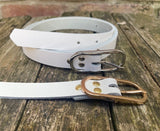 Plain leather 19mm wide belt with nickel plated or gold plated buckle. Choice of 13 colours.