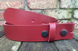 Plain leather 19mm-50mm wide press stud/snap belt with black steel studs. Choice of 13 colours.