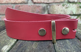 Plain leather 19mm-50mm wide press stud/snap belt with brass plated steel studs. Choice of 13 colours.