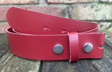Plain leather 19mm-50mm wide press stud/snap belt with nickle plated steel studs. Choice of 13 colours.